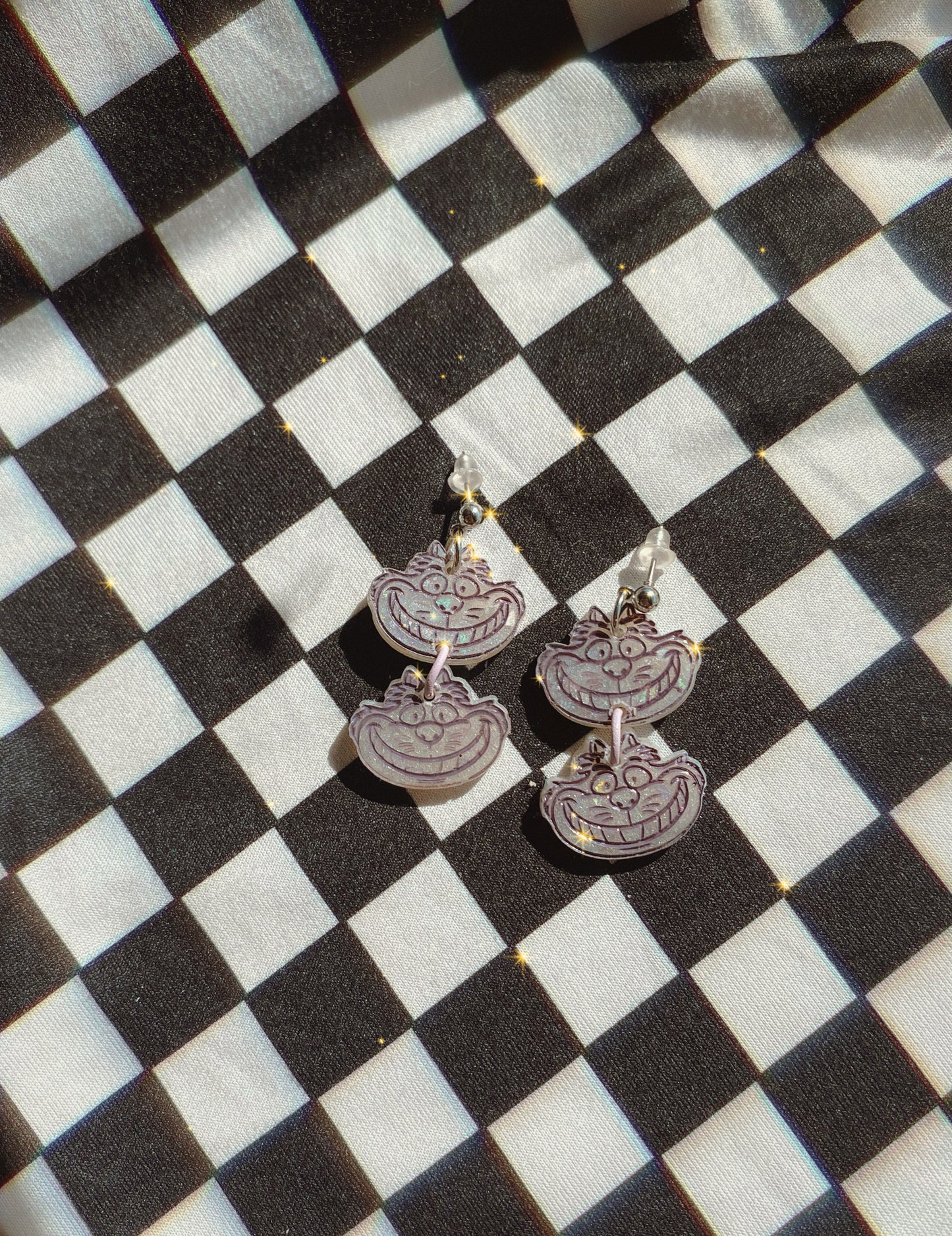 Pendientes Cheshire